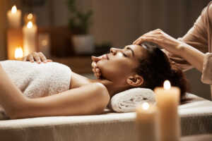 attractive-african-woman-enjoying-face-massage-spa-salon (1) Massage in Columbus, Ohio