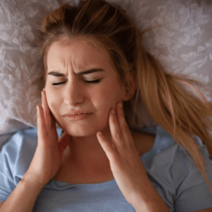 tooth clenching can cause sleep disturbance