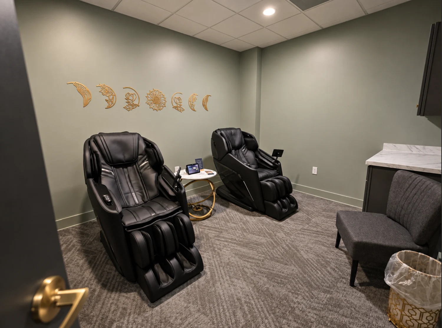 Room with two zero gravity massage chairs at Body Ache Escape in Pickerington