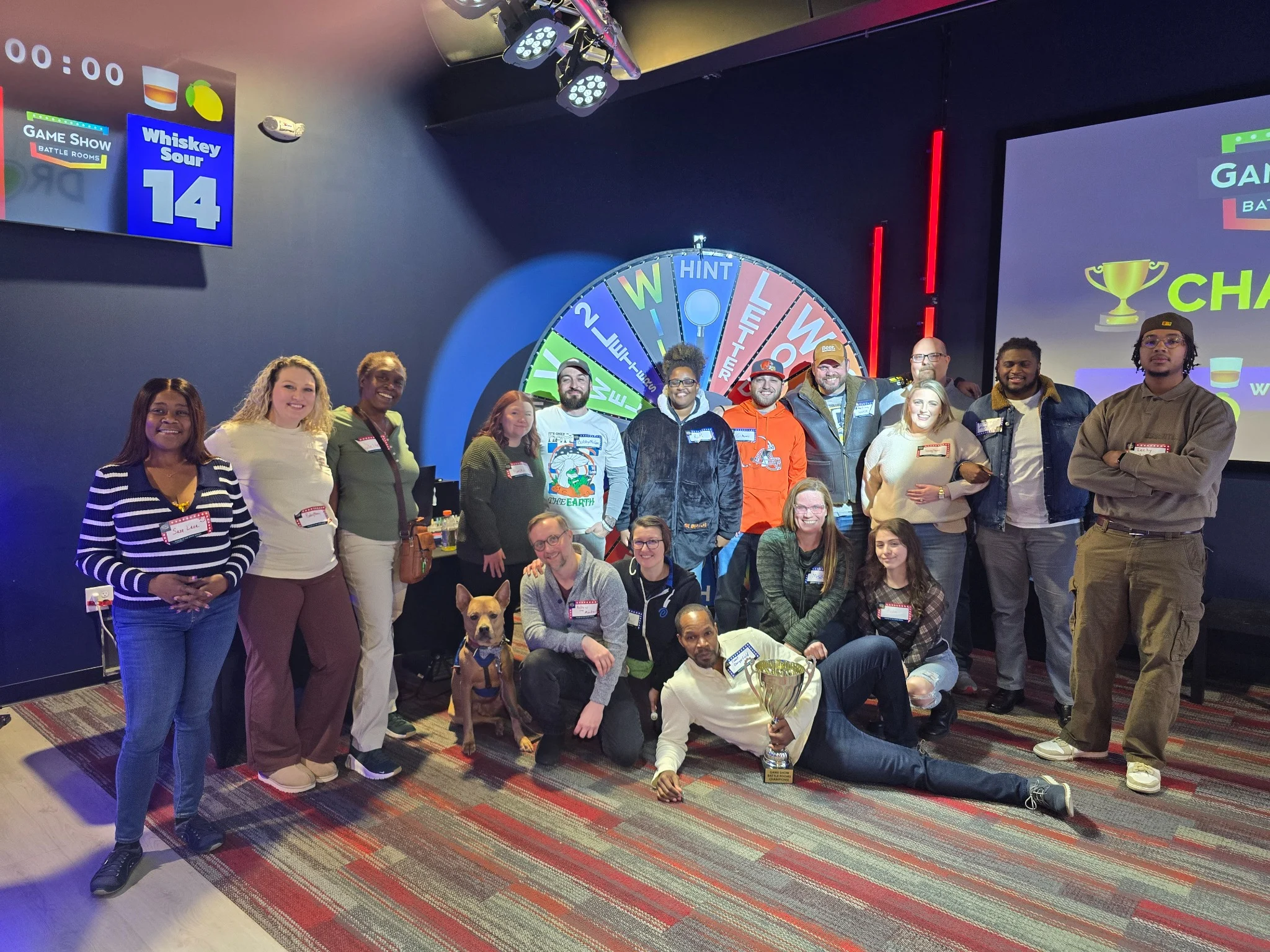 Body Ache Escape team enjoying a game show outing together