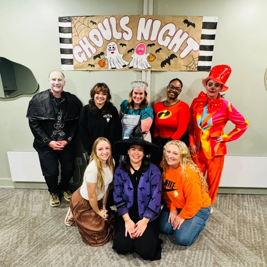 ghouls night body ache escape team photo Body Ache Escape team celebrating Ghoul’s Night Glow in Halloween costumes